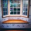 View of bay window and seat from inside house